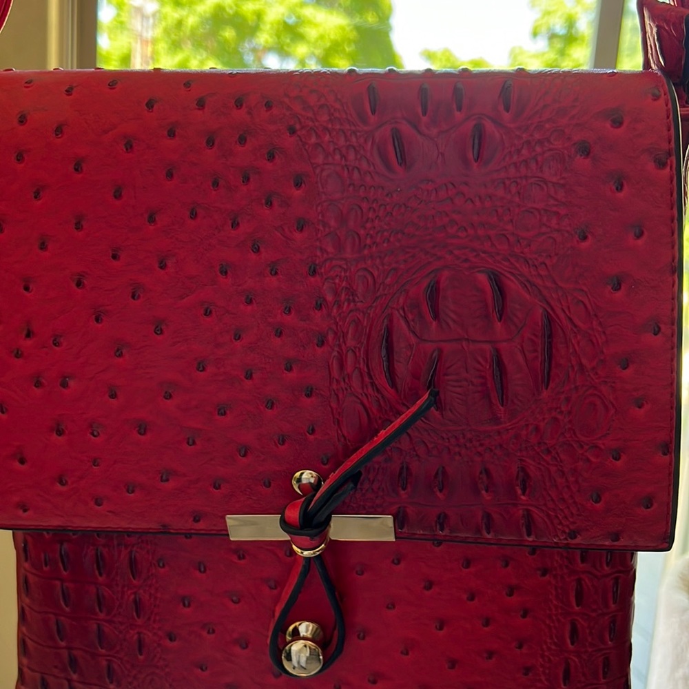 Red textured faux leather cross body, (strap is adjustable) purse